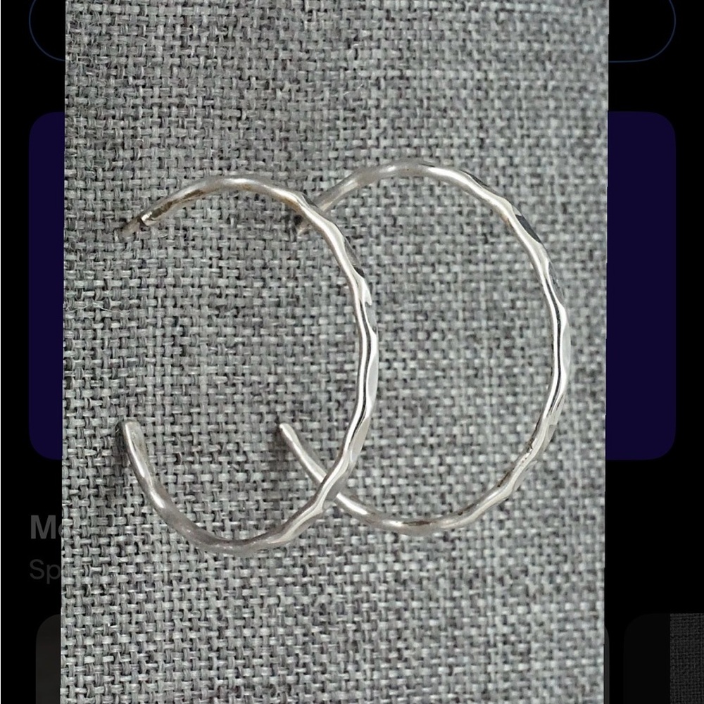 Sterling silver hoops by Elaine Tahe